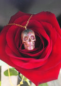 "Dead inside, but glowing outside" skull necklace